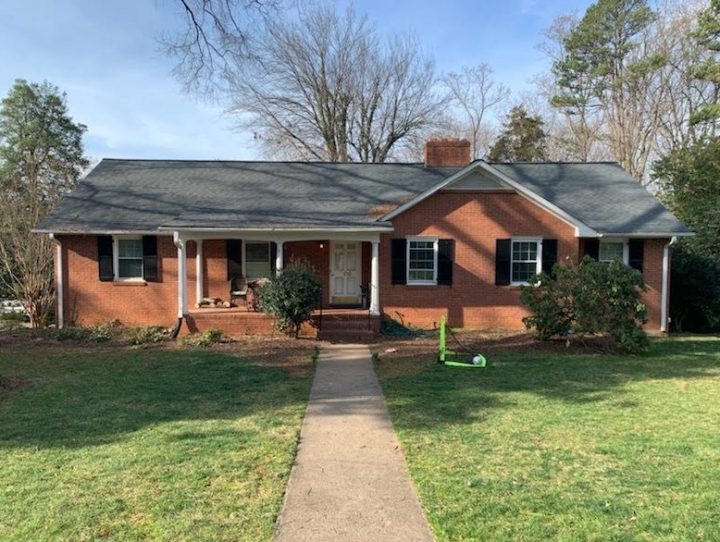 brick home before exterior painting in Winston-Salem