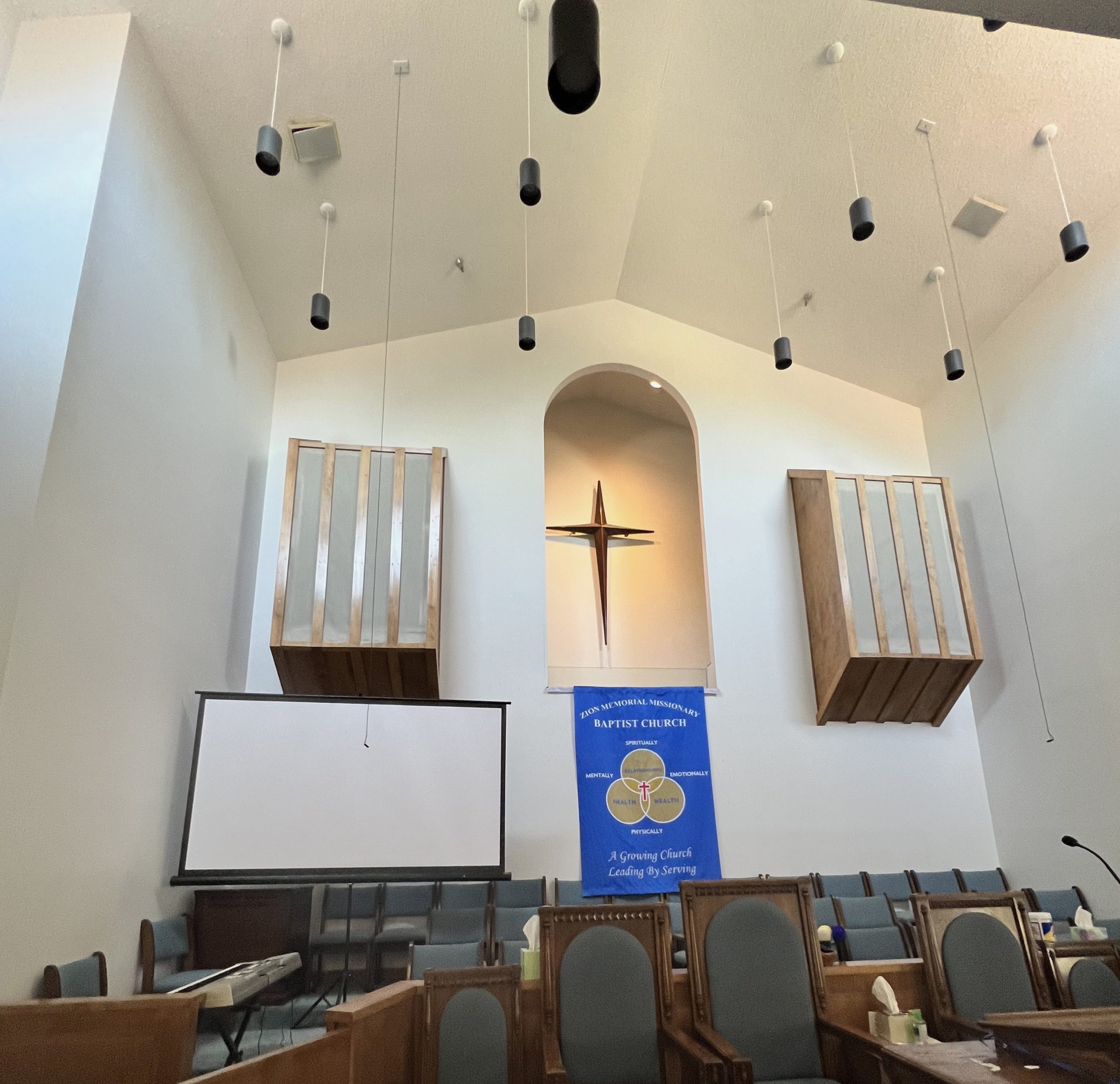 Winston-Salem Zion Memorial Baptist Church Popcorn Ceiling removal of high-ceiling cathedral.