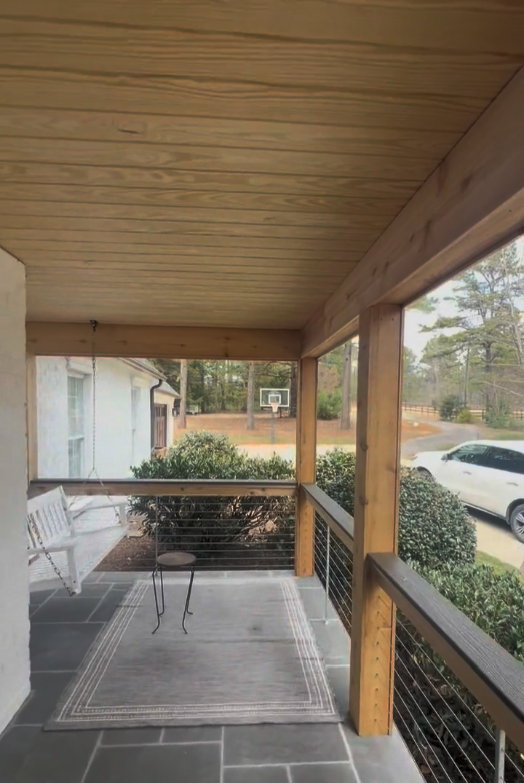 Before Porch and railing staining in Winston-Salem