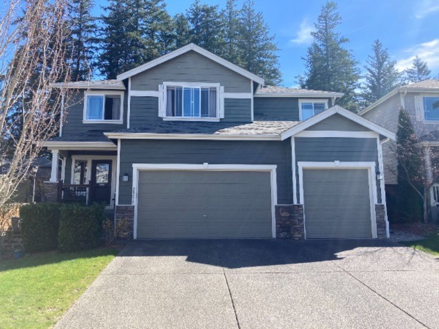 house exterior with multiple shade of grey before repaint