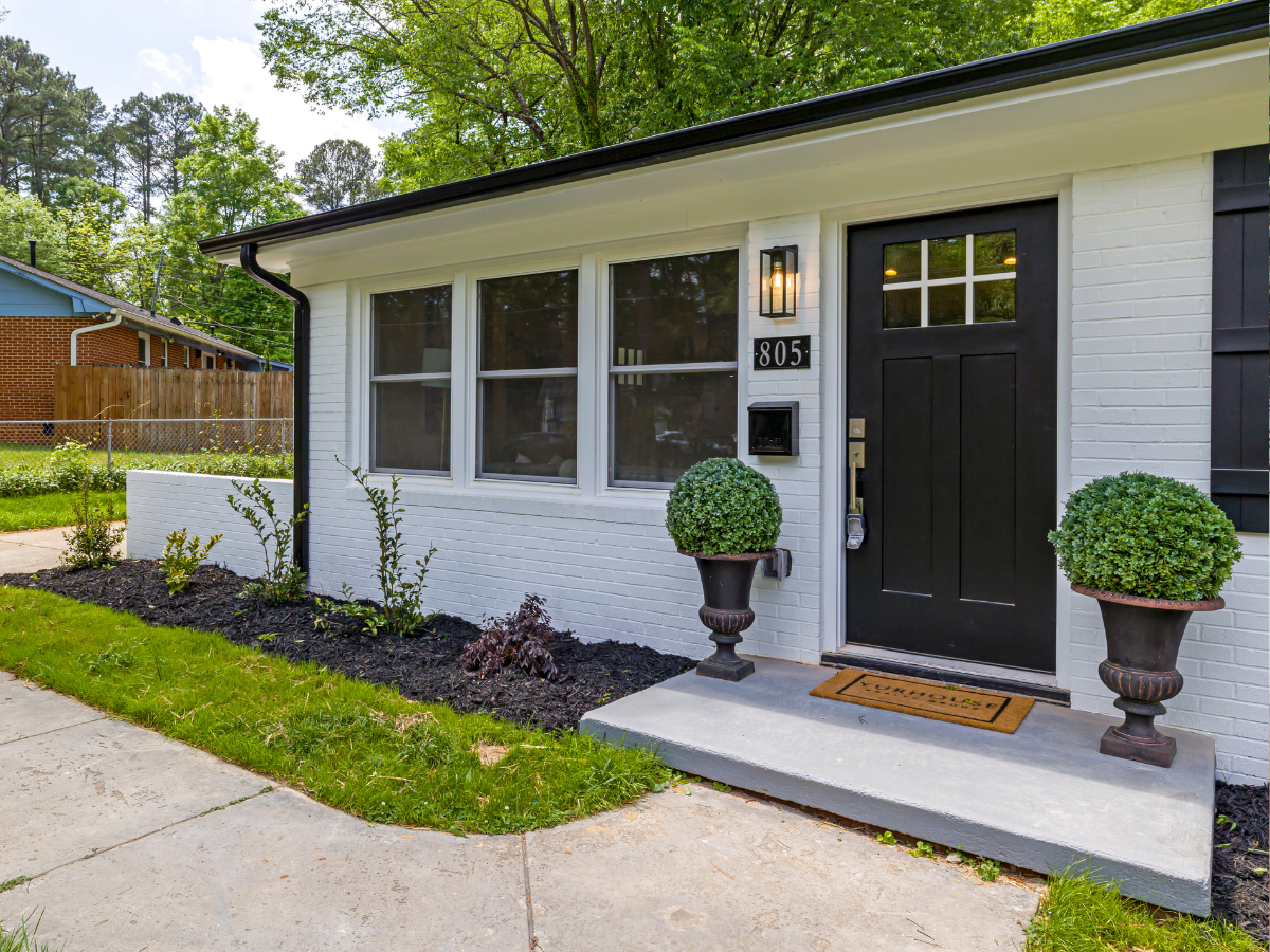 white and black brick home in texas