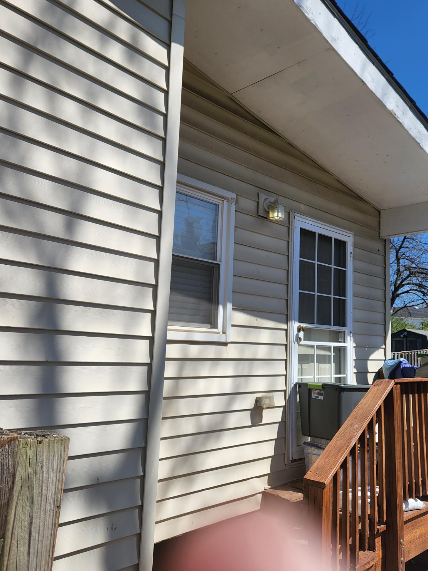 vinyl siding was originally a white color before the repaint