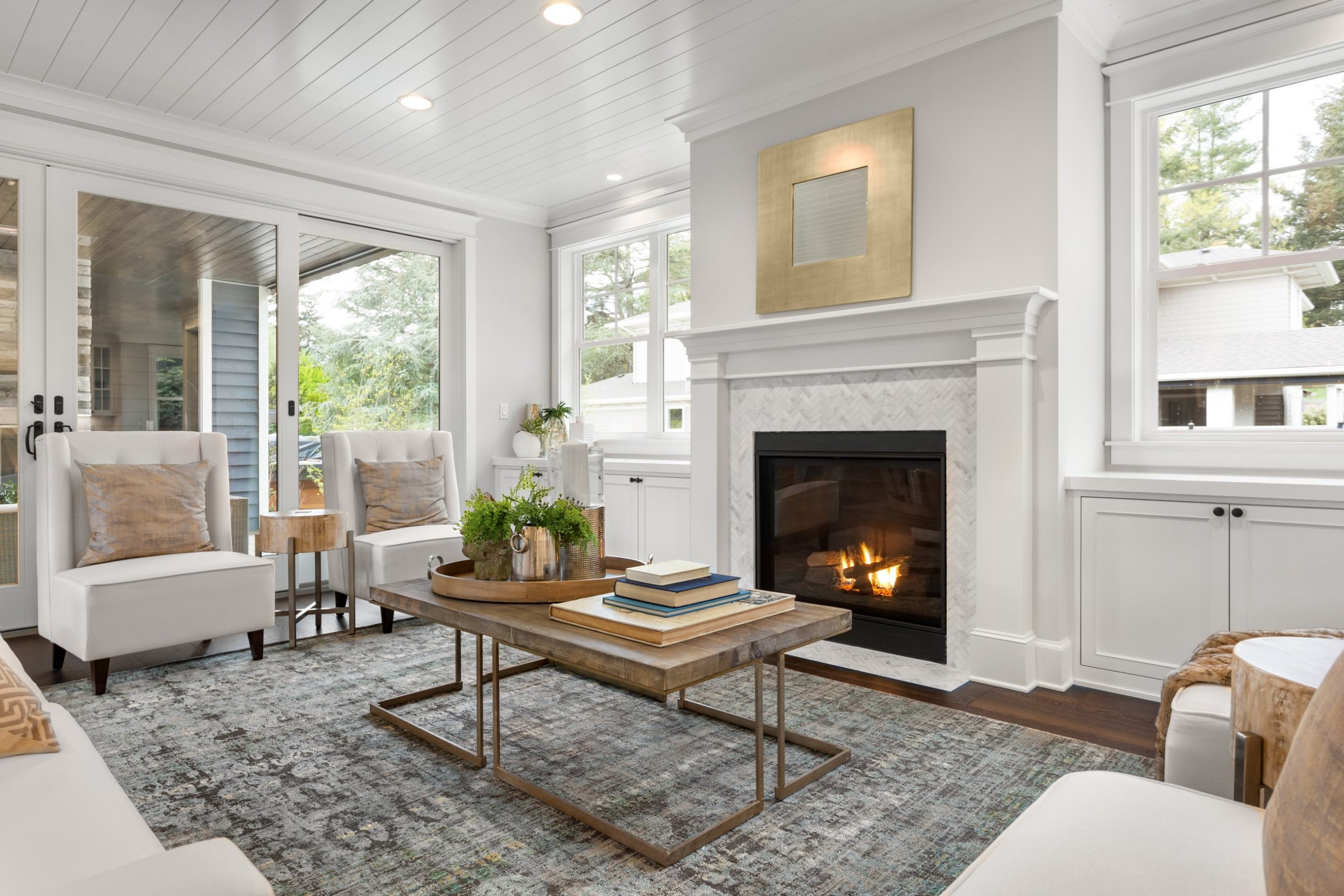 white living room with fireplace