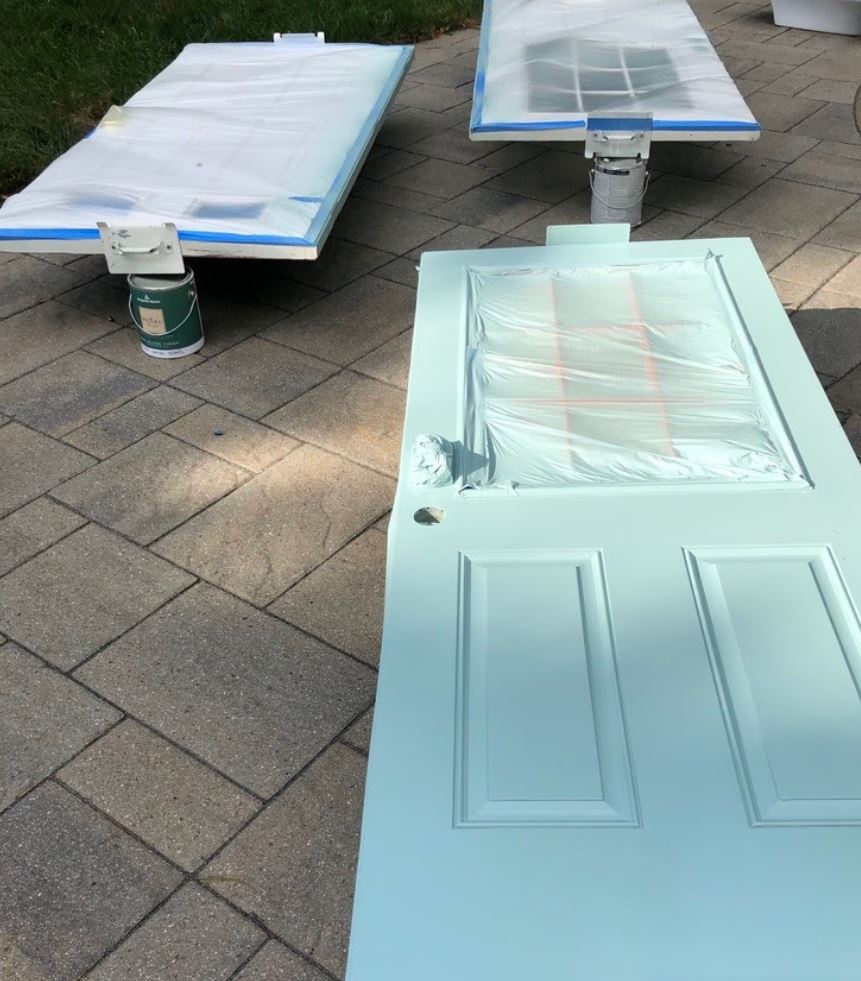 Doors are sprayed Sherwin Williams’ Festoon Aqua