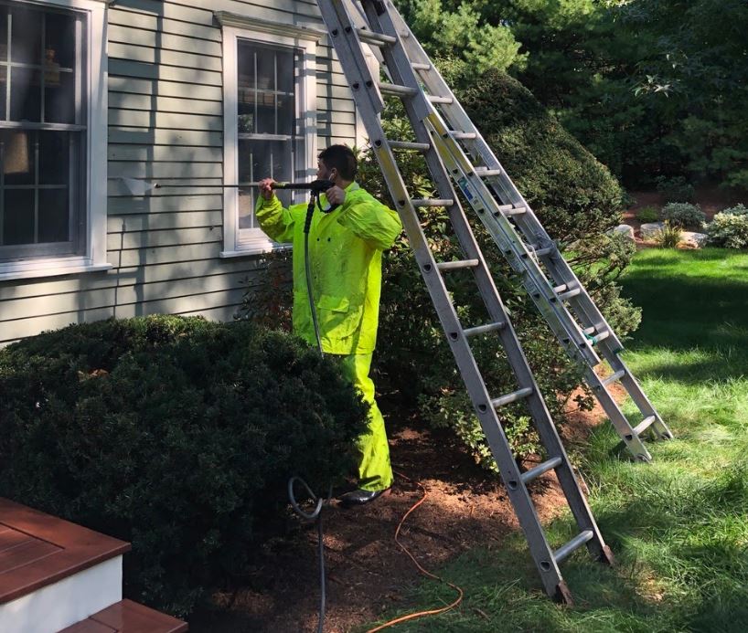 power washing house to prep for painting