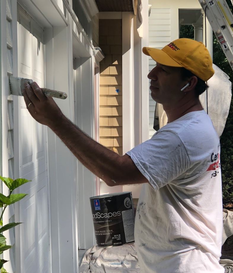 ray painting clapboards