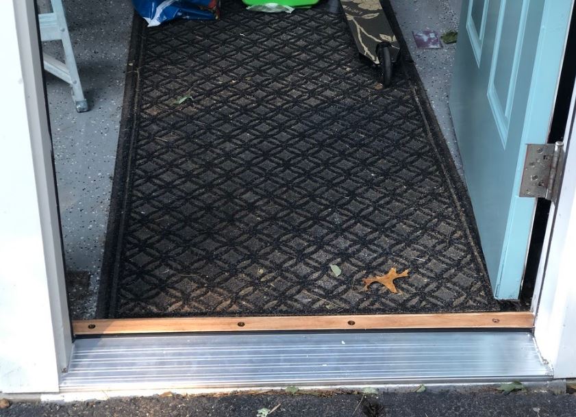 The old threshold is replaced with a new one.