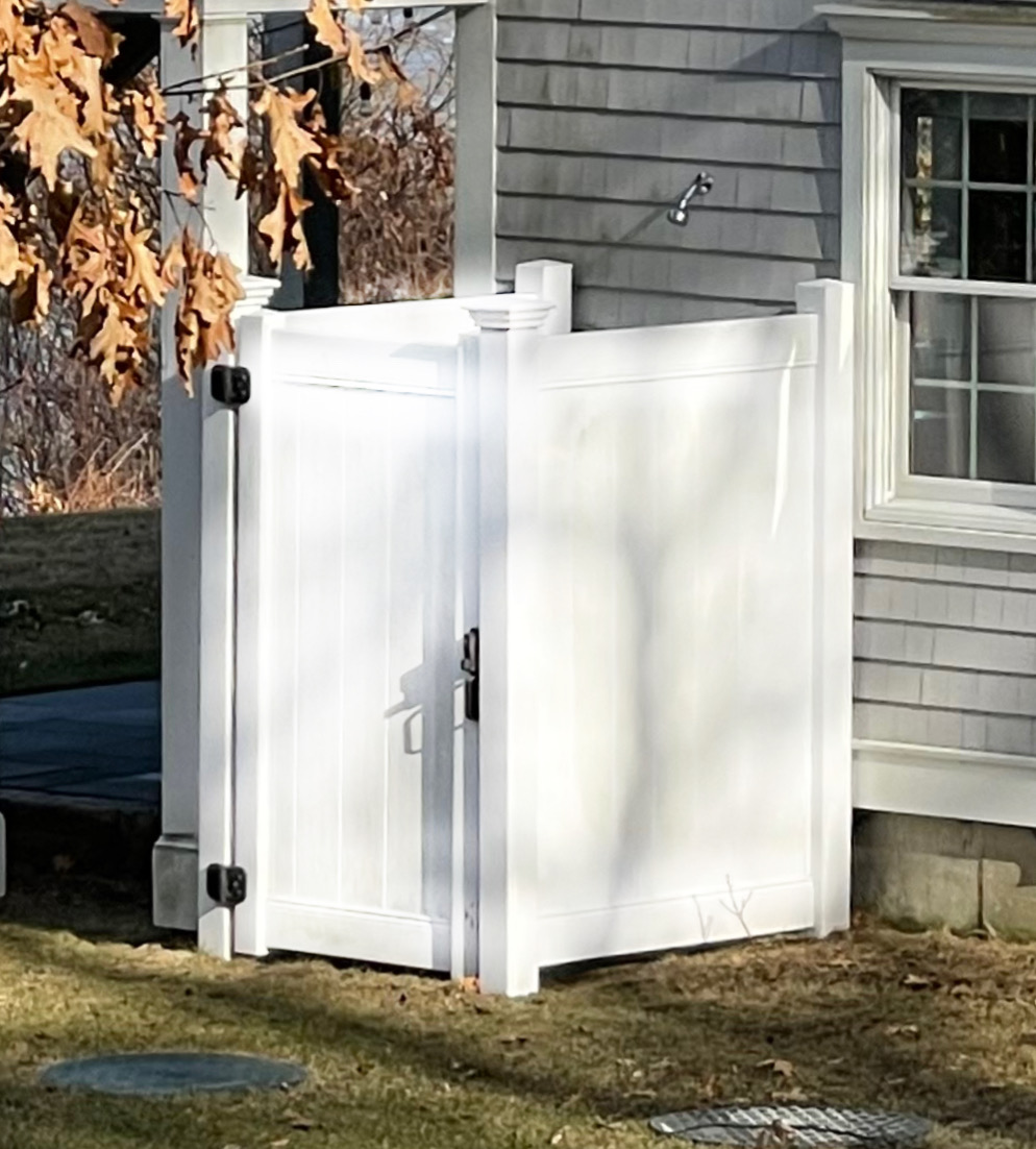 white outdoor shower enclosure