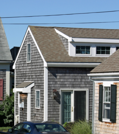 Gray shingled cape cod home