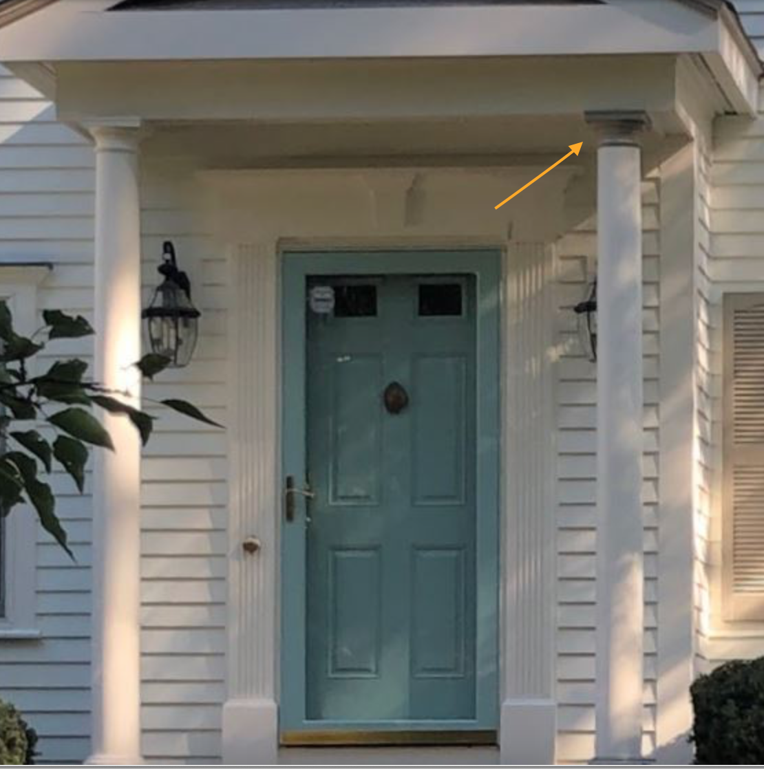 White house with blue door