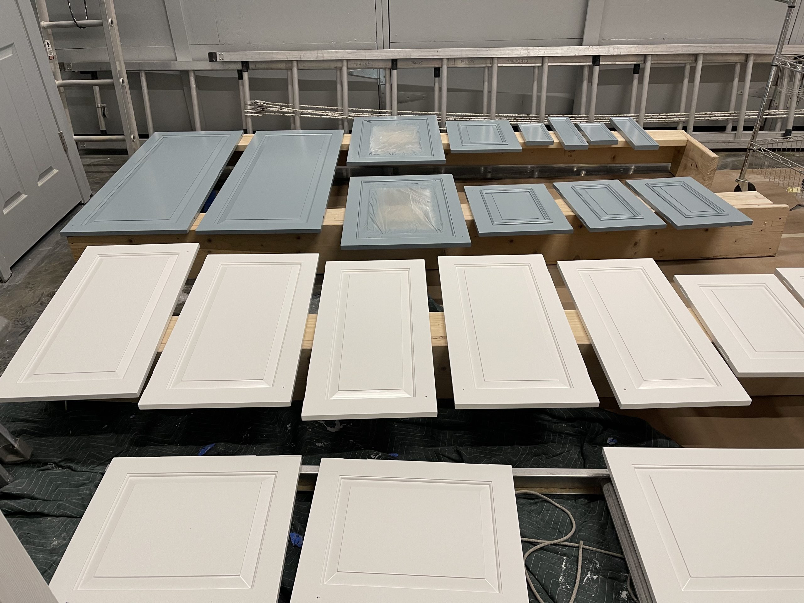 kitchen cabinet doors in process of being painted