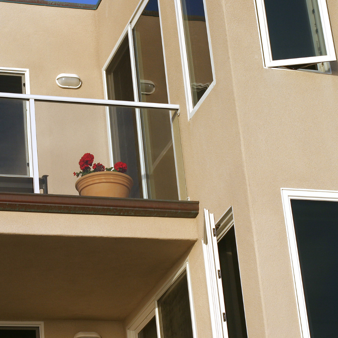 Close up of Beige Stucco condominium in the Boston area