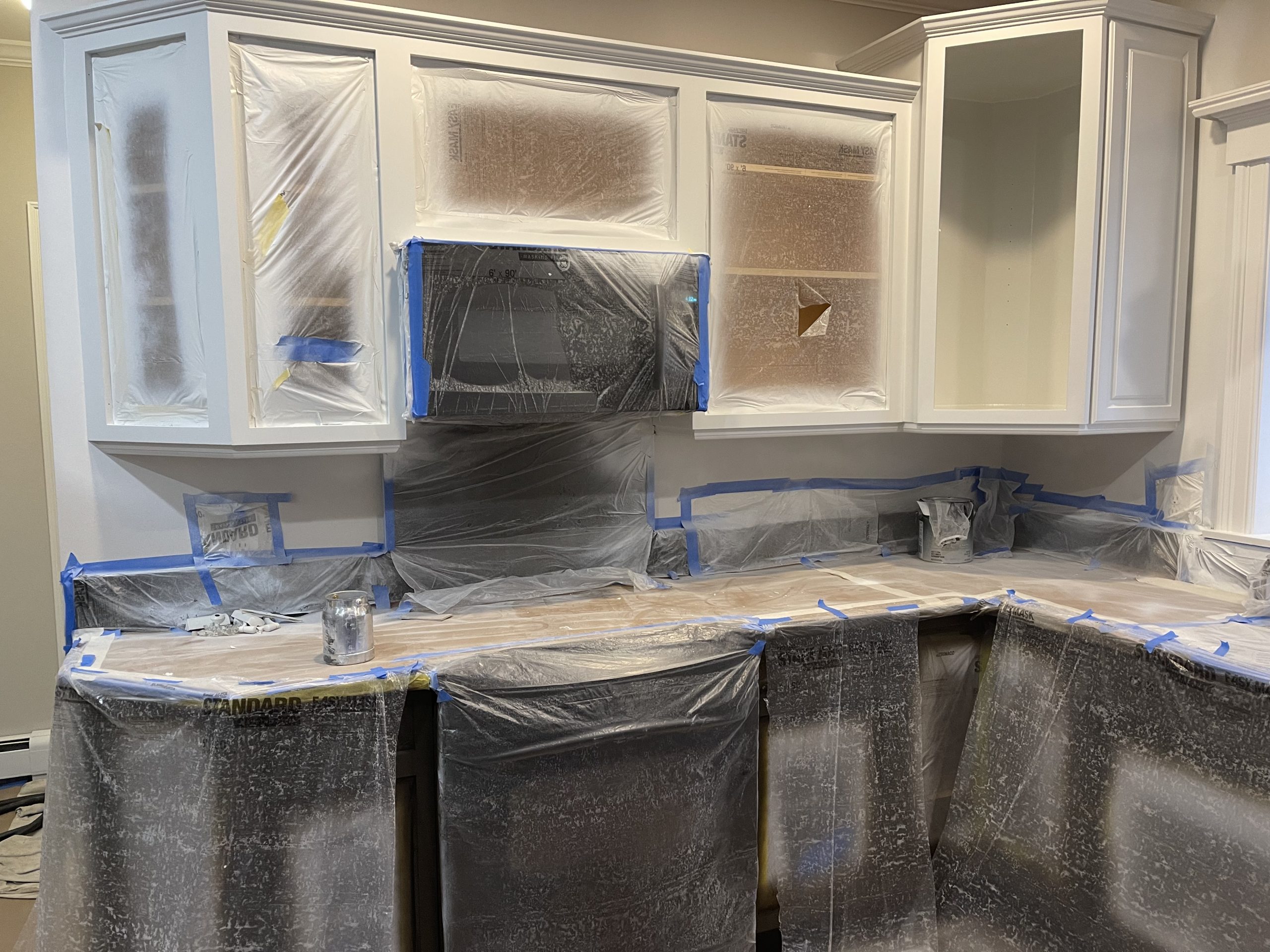 masked and srayed kitchen cabinets