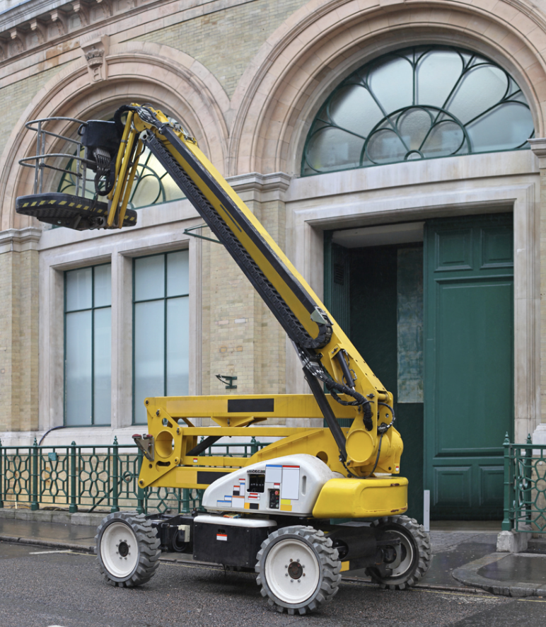 Yellow articulating boom lift