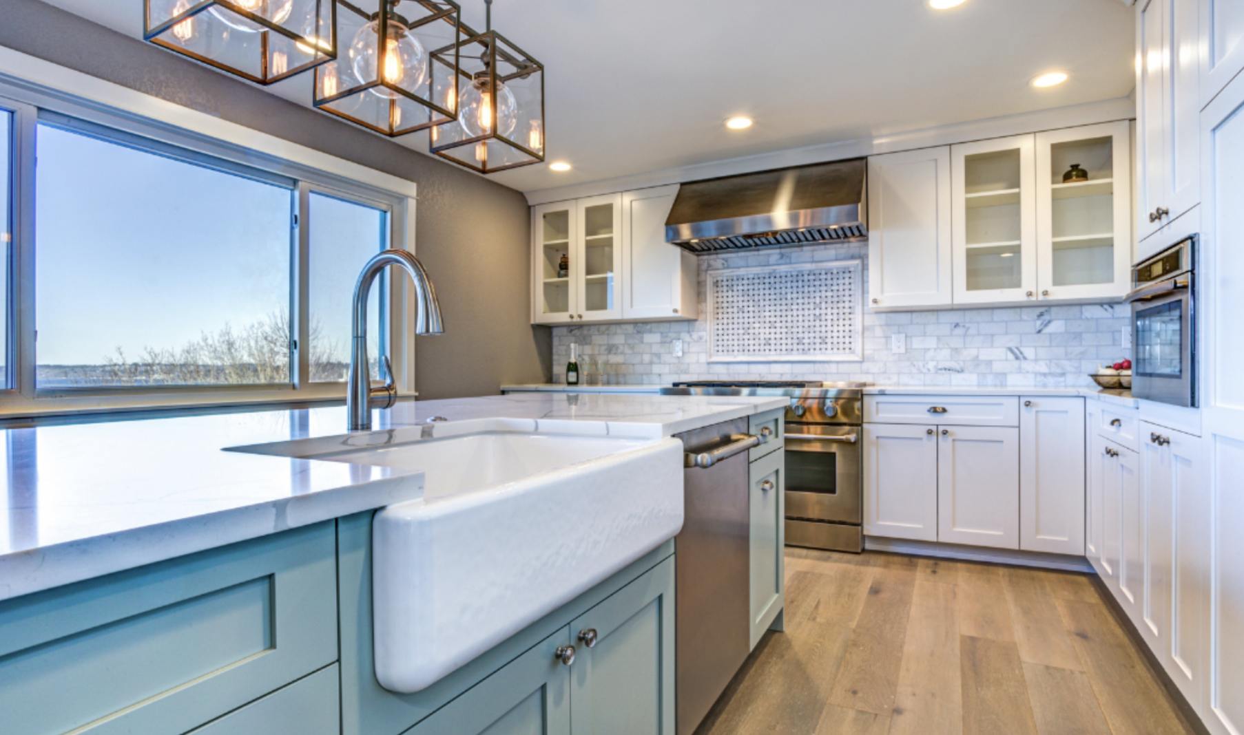 White top cabinets and blue bottom cabinets in Scituate kitchen
