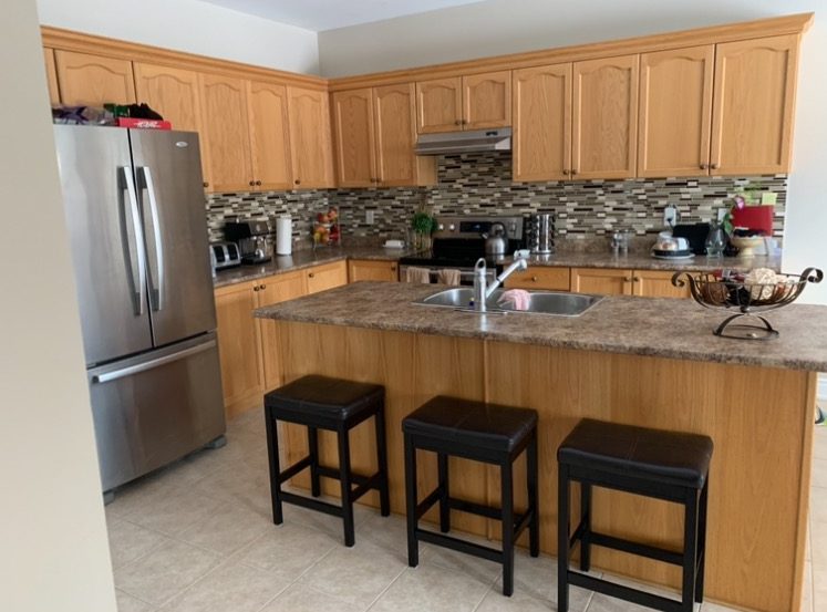 Kitchen Cabinet Repainting Before & After Before