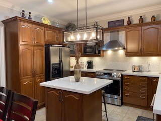 Kitchen Cabinet Painting Before / After Before