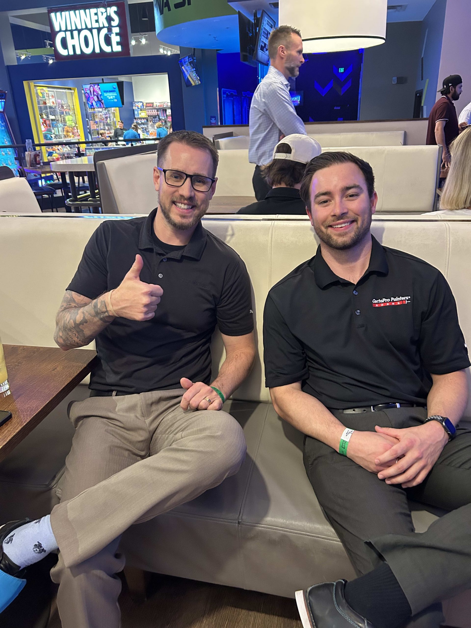 two men on bowling couch