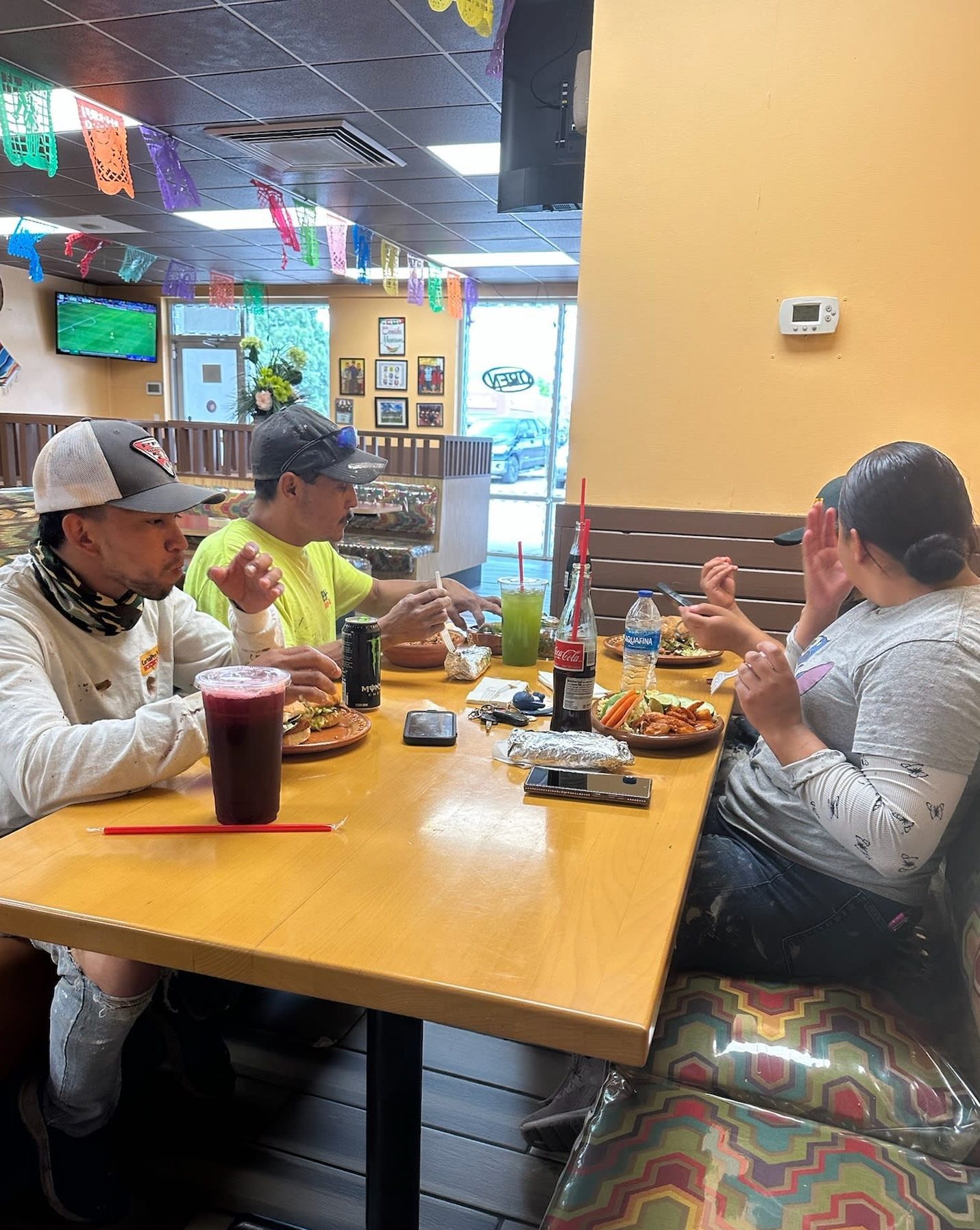 group of people eating in a restaurant