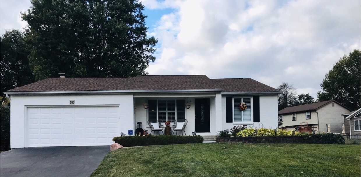 Brick house after painting by CertaPro Painters of Columbus