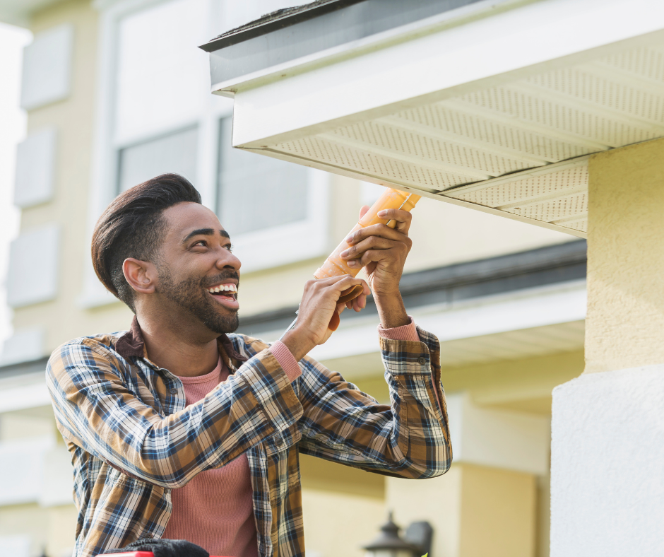 man exterior painting and repairing