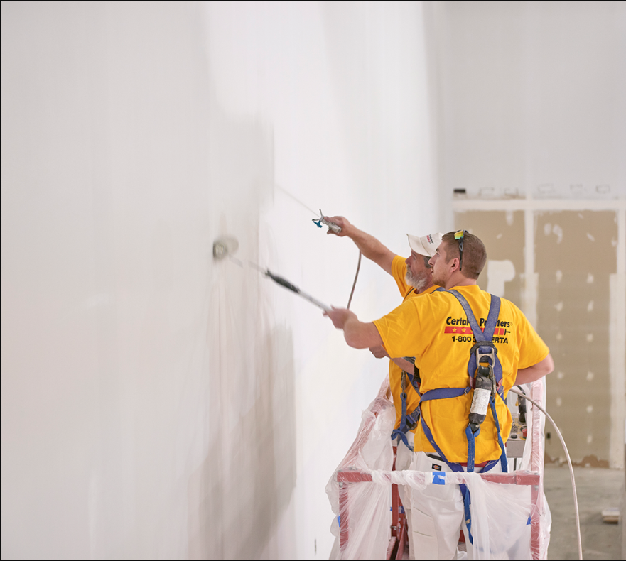 Warehouse interior painting by CertaPro team members