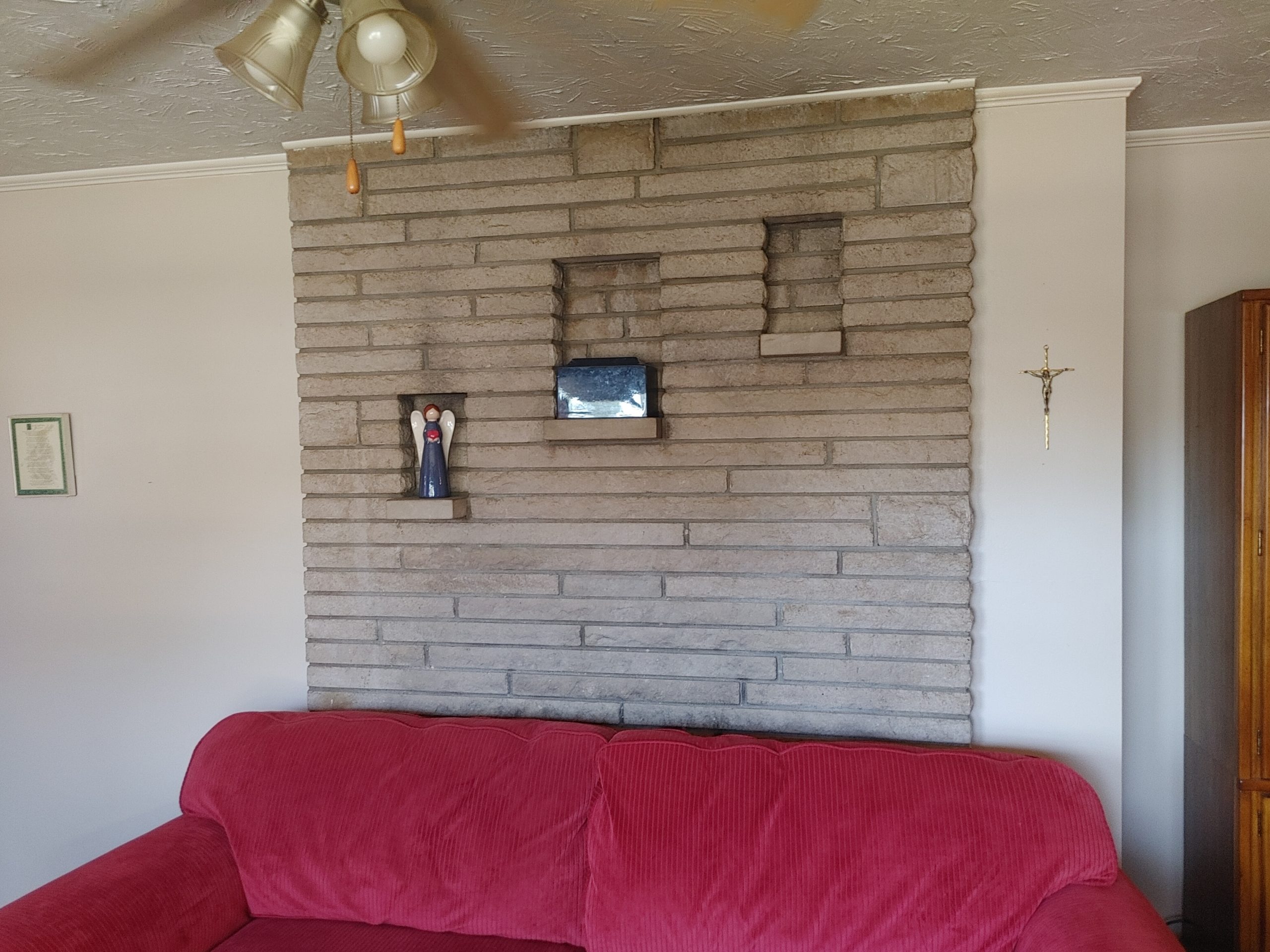 Brick fireplace before painting by CertaPro Painters of Columbus