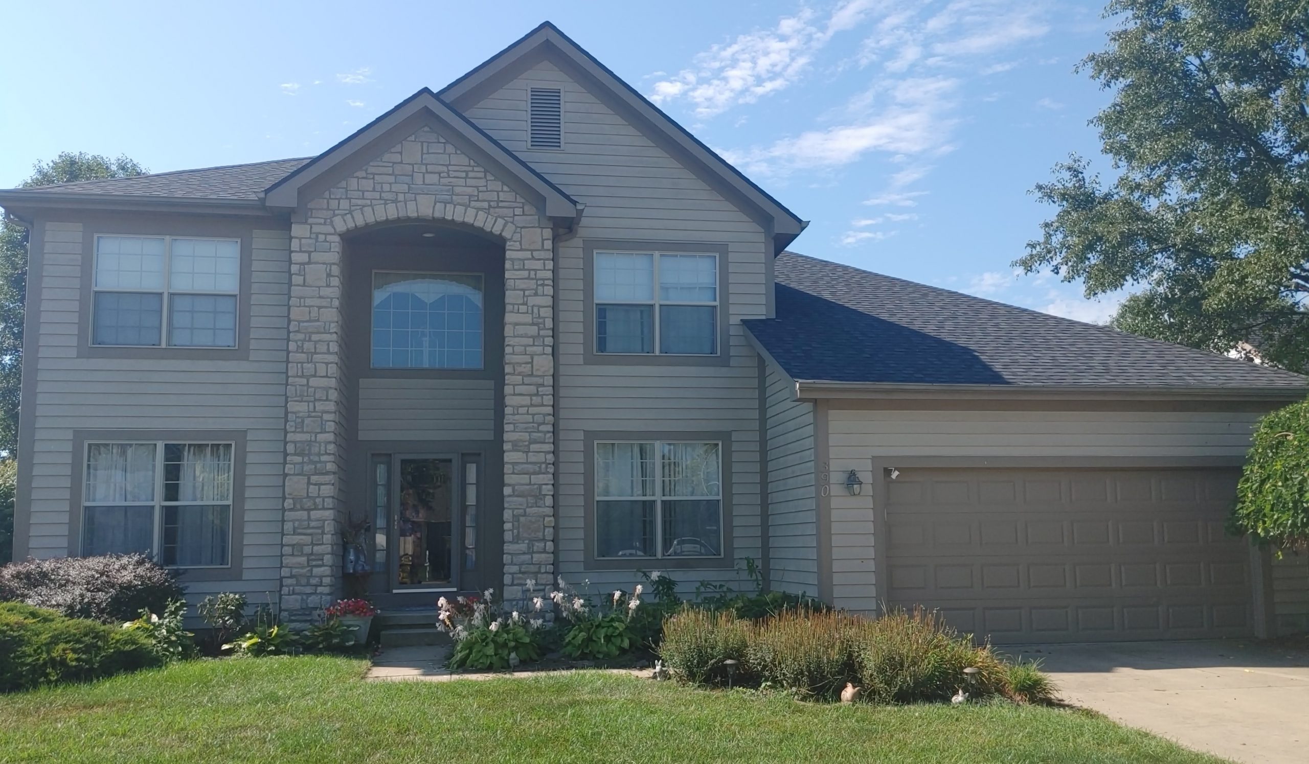 house exterior with cedar siding