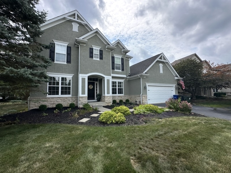 painted house exterior with white trim