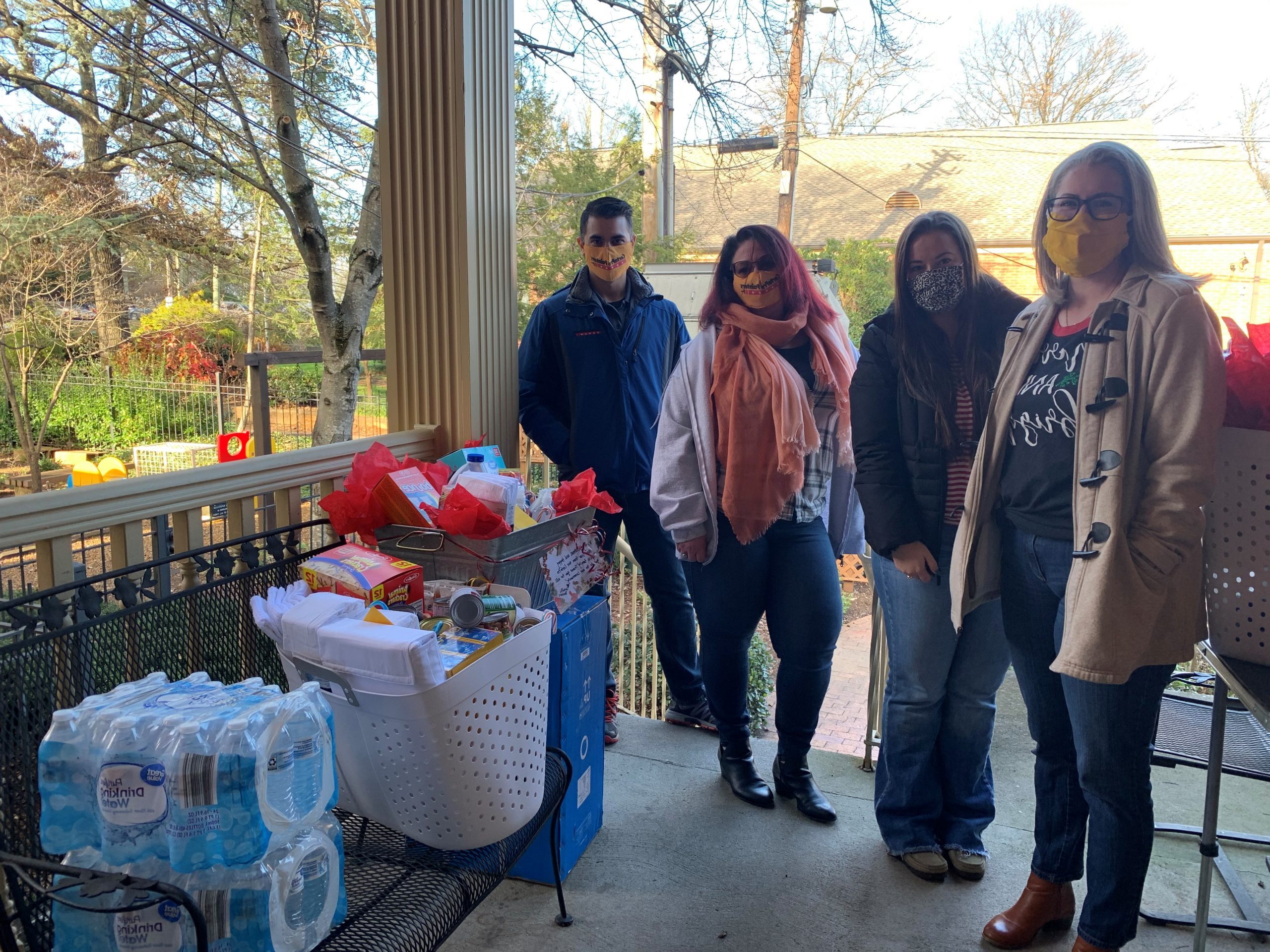 certapro team posing with donations