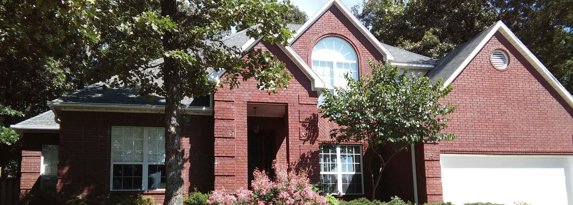 Exterior house painting by CertaPro painters in Fayetteville, AR