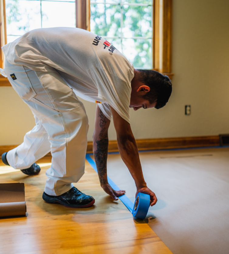 painter prepping a room