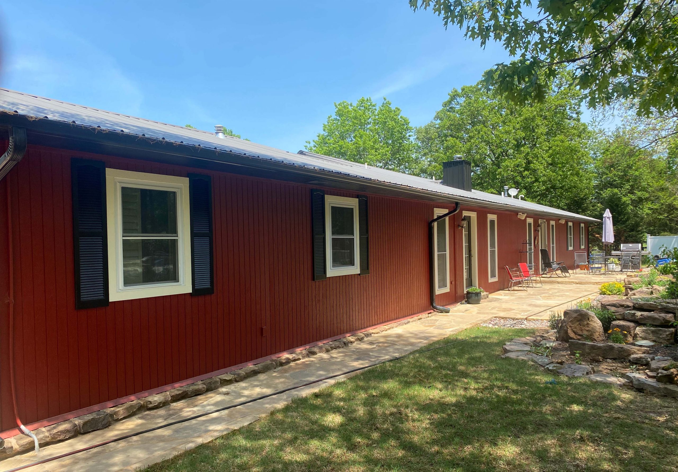red and white house after painting