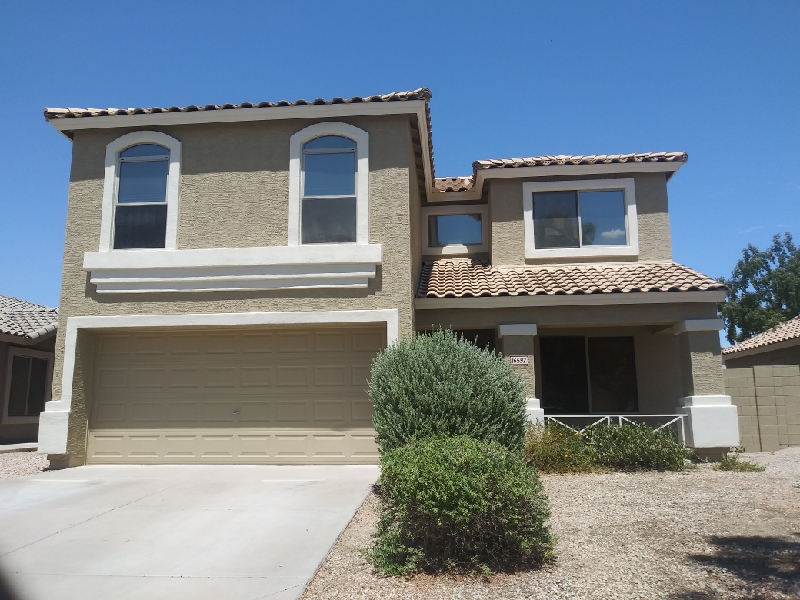 Stucco home after repainting