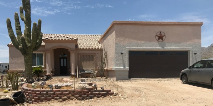 Stucco exterior before refinishing