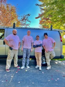 Job site supervidsor David Cooper and his painting crew