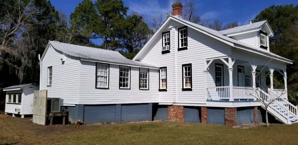 Final Result of Light House with a refreshed white coat and blue painted deck