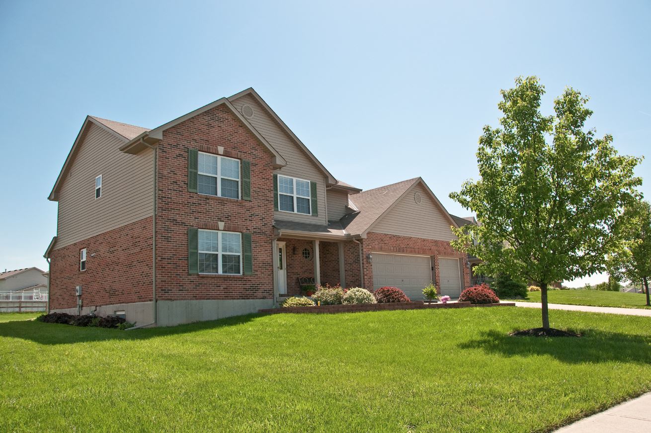 2 story home with siding and trim