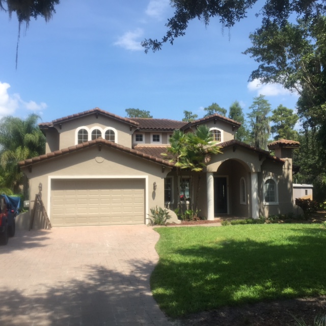 Exterior house painting by CertaPro painters in Ocoee, FL
