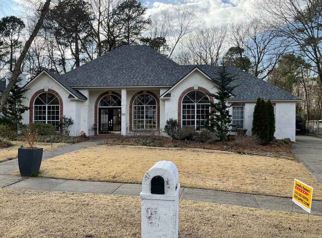 Brick Home Repainted Modern White After