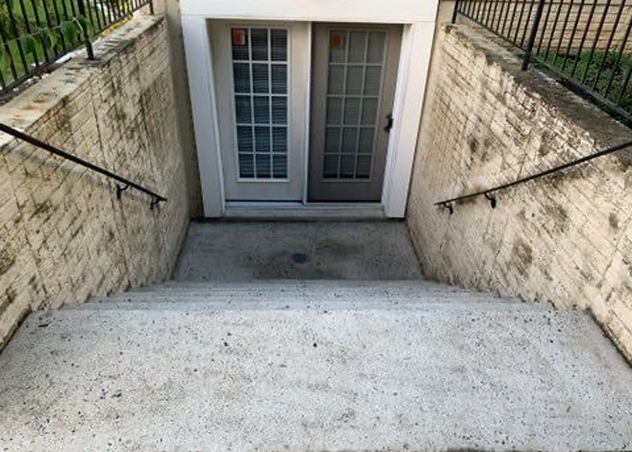 basement walkout prior to painting