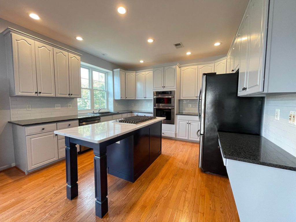 Interior Painting of Kitchen painted white and navy blue