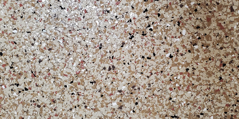 heavily pitted and salt damaged garage floor)