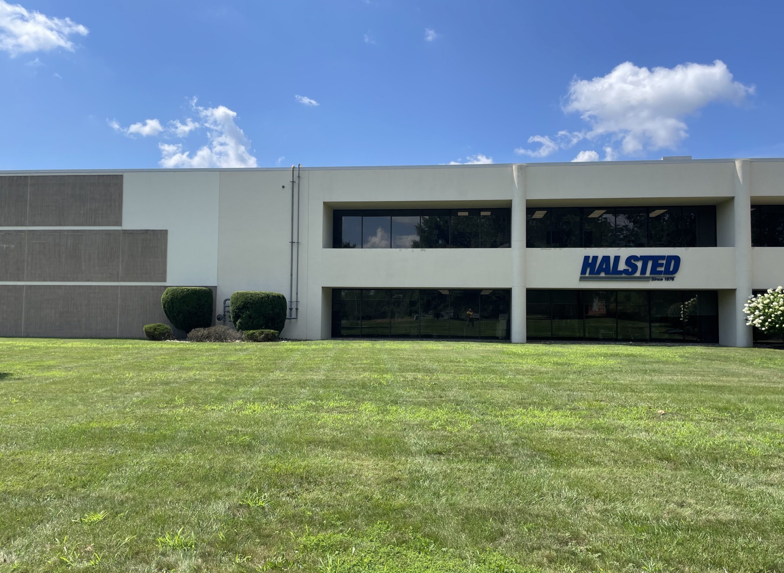 Before commercial industrial exterior painting facility for office warehouse in Cranberry, NJ.