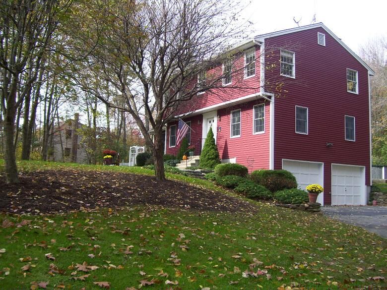 Exterior house painting by CertaPro house painters in Lebanon, CT
