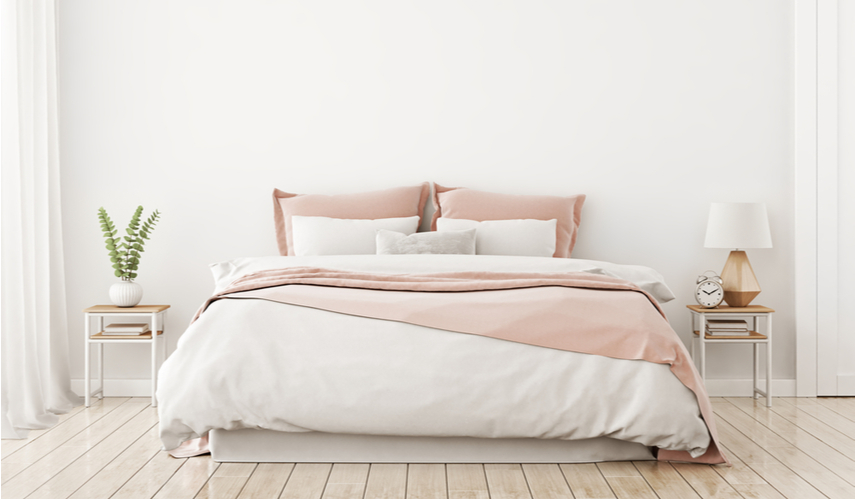 Bedroom painted a shade of off-white.