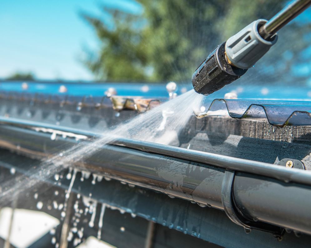 cleaning a gutter