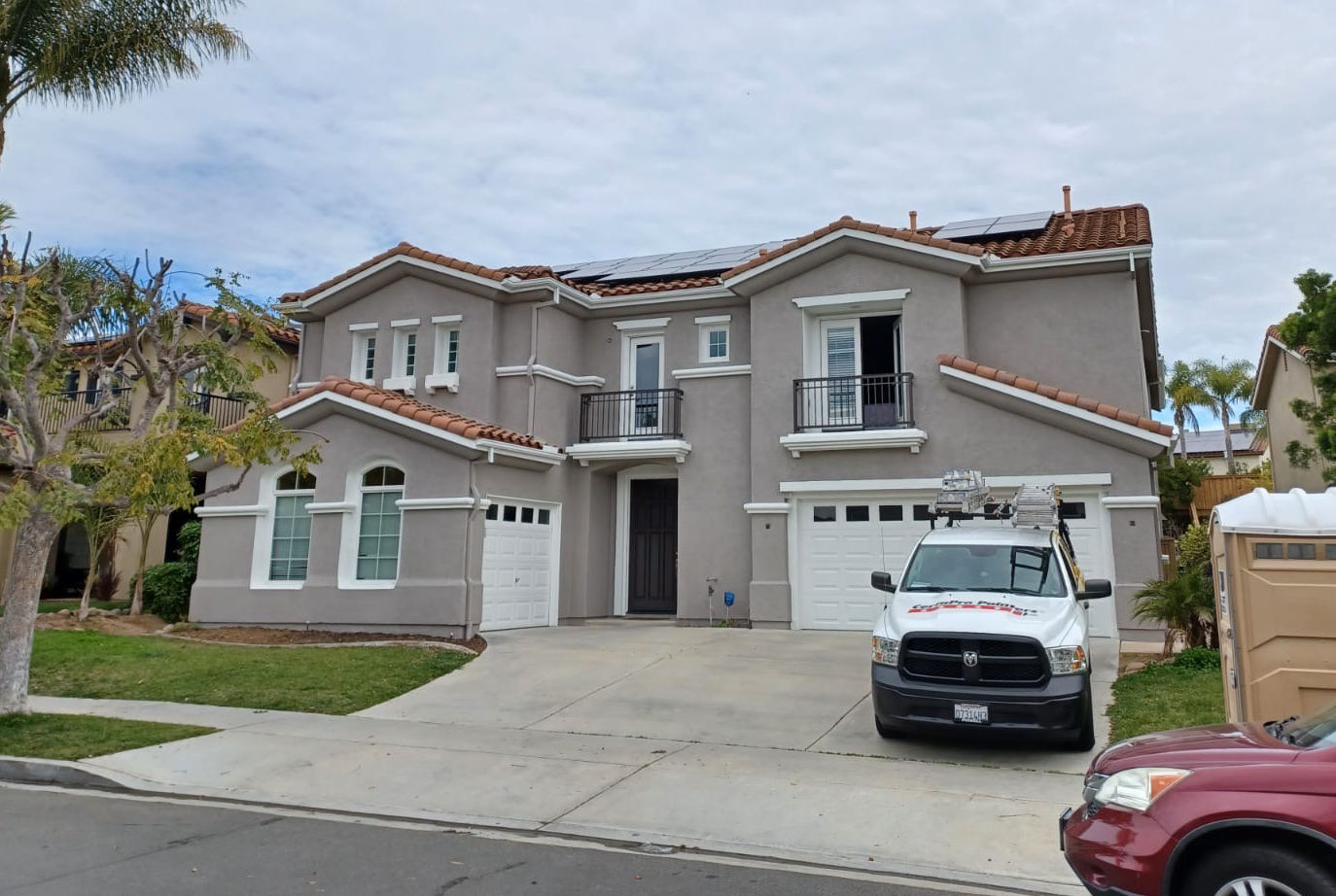 Two-Story Home Exterior Repainted After