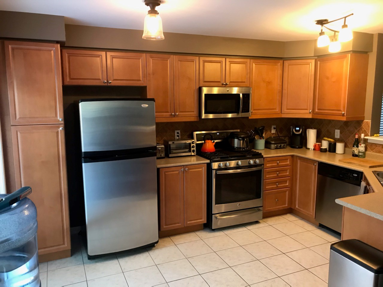 Kitchen Cabinet Repainting Project Before photo