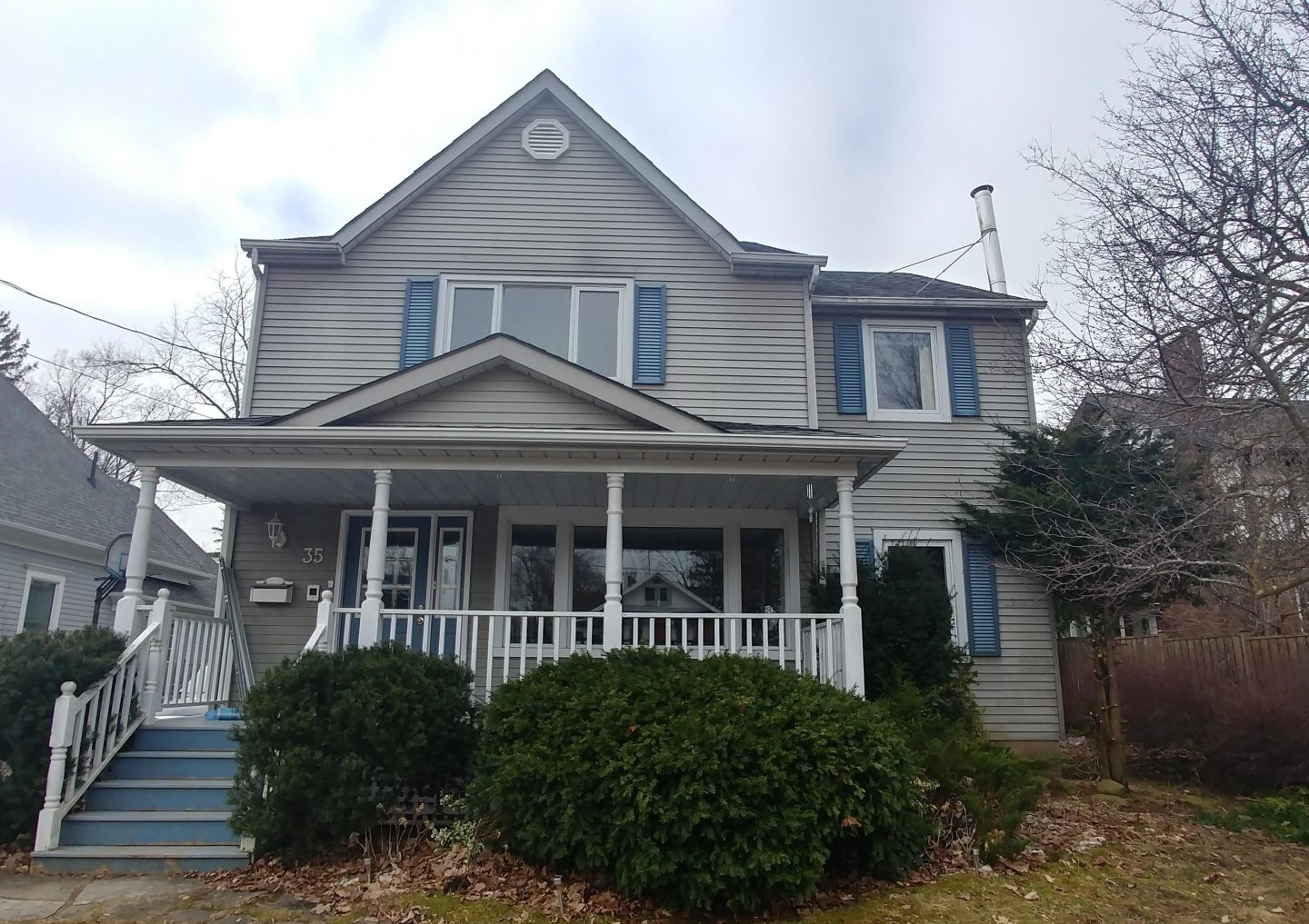 Residential exterior painting project before photo